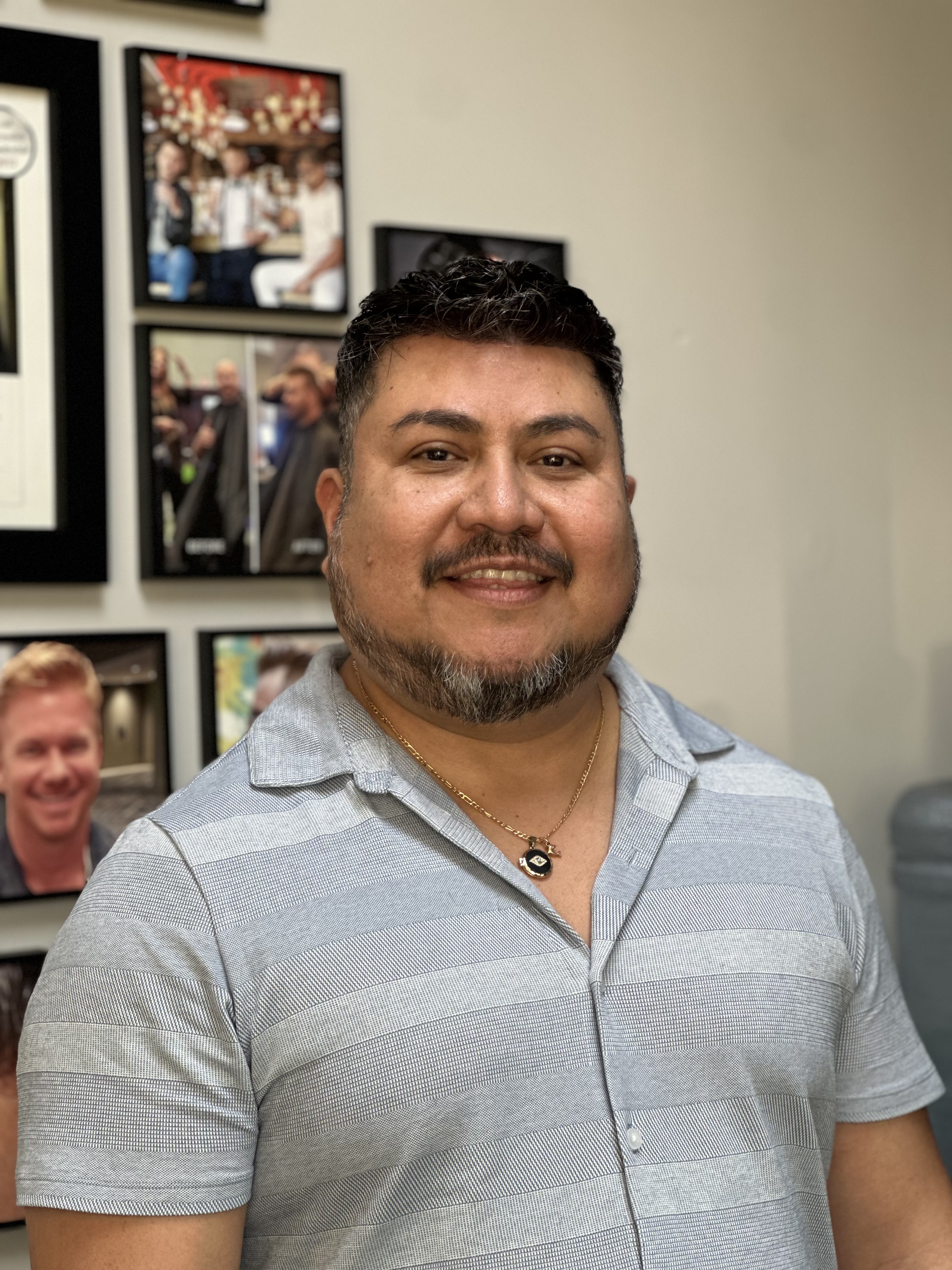 a man smiling at camera
