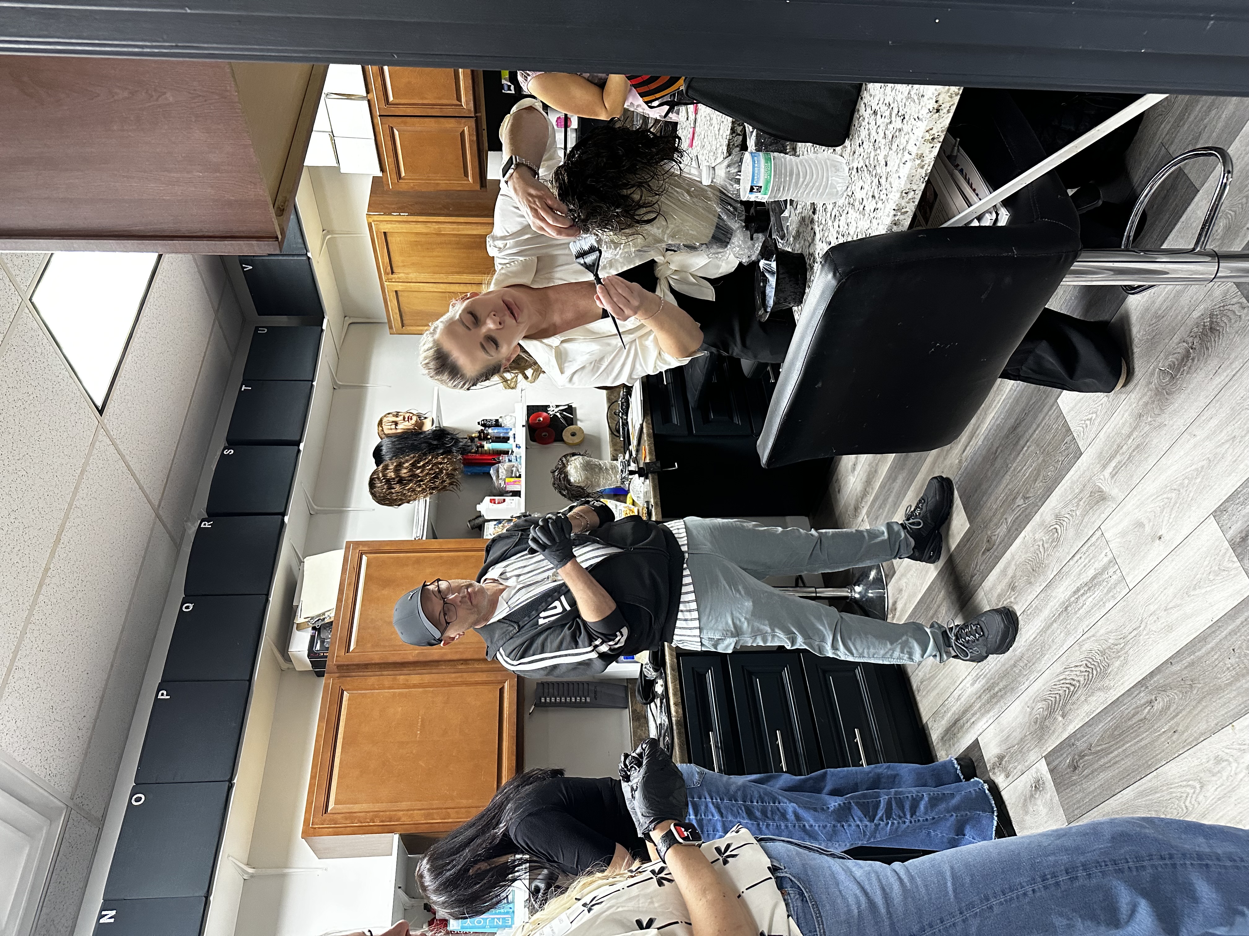 a group of people in a salon