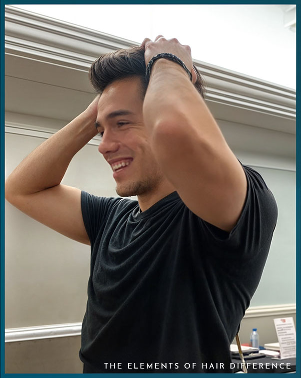 a man holding his hair